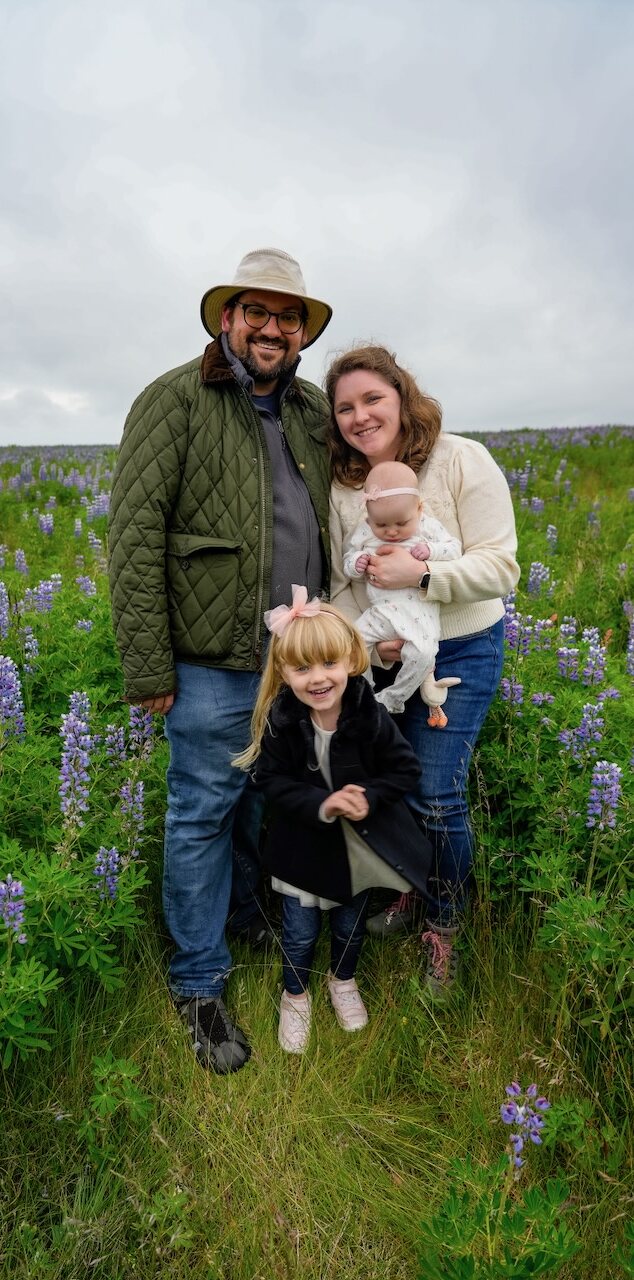The presenter with his family in a field of lupines